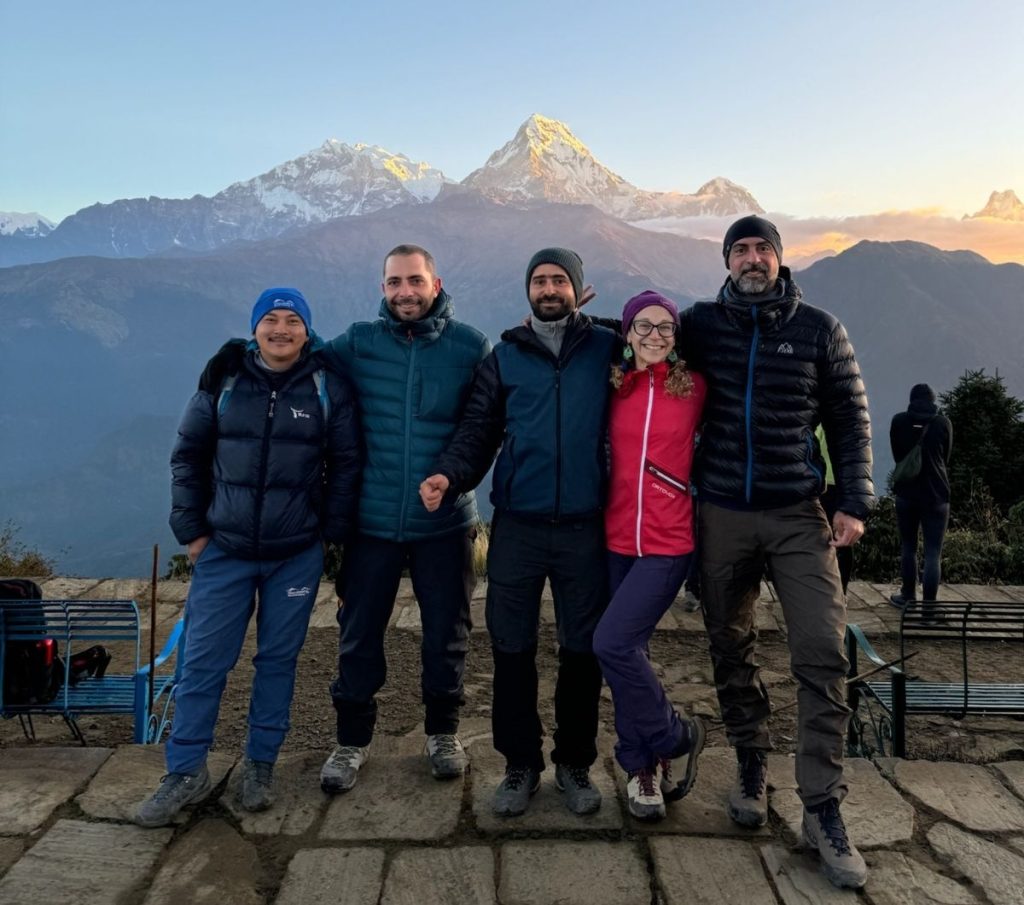 Trekkers on Ghorepani poon hill with Annapurna South View